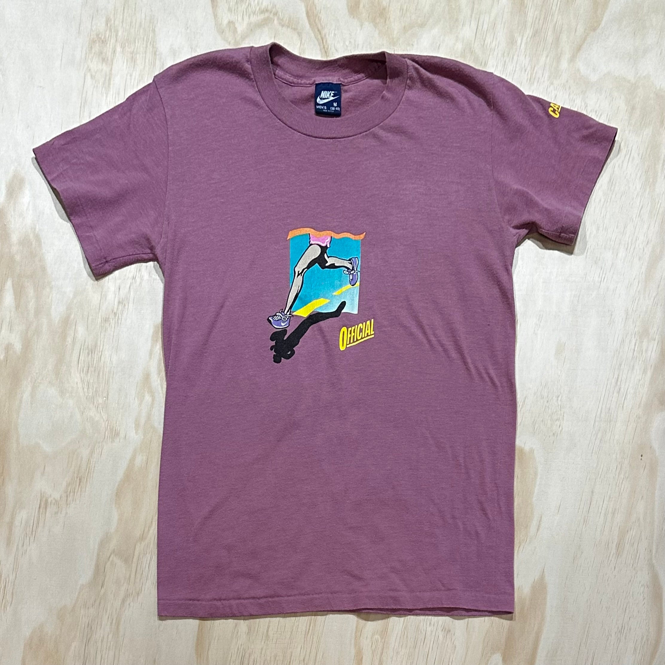 Blue pink and purple nike shirt on sale