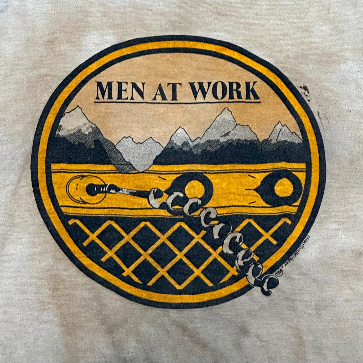 Vintage 1980s Men at work 1983 “Business as usual” raglan tshirt