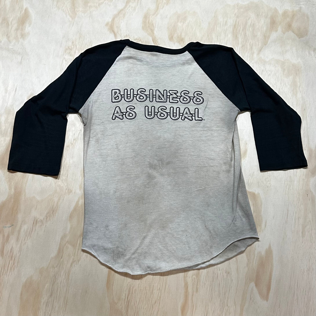 Vintage 1980s Men at work 1983 “Business as usual” raglan tshirt